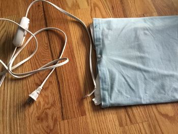 High angle view of heating pad on floor
