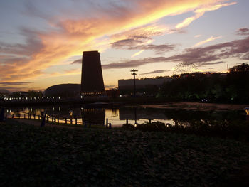 View of illuminated buildings at waterfront