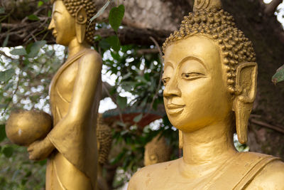 Close-up of statue against temple