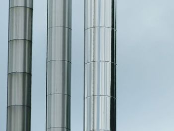 Low angle view of metal structure against sky