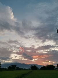 Scenic view of silhouette landscape against sky during sunset