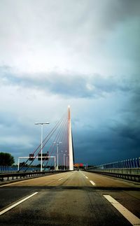 Bridge over road against sky