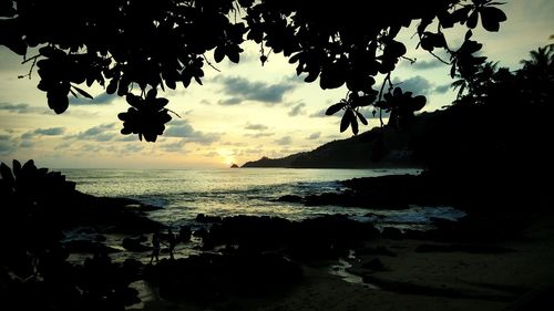 Scenic view of sea at sunset