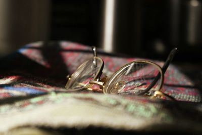 Close-up of wedding rings on table