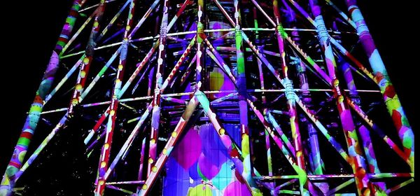 Low angle view of built structure at night