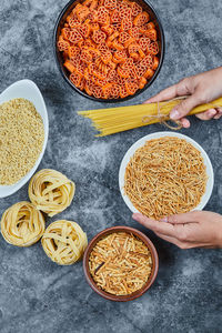 High angle view of hand holding food