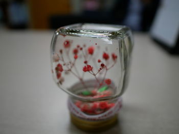 Close-up of jar on table