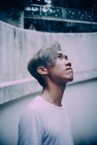 Close-up of young man looking up