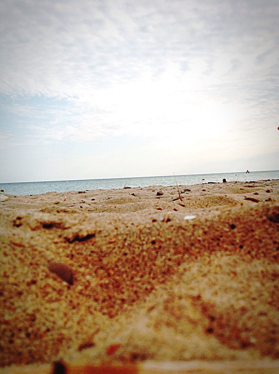 sea, beach, horizon over water, water, shore, sand, tranquil scene, tranquility, sky, scenics, coastline, calm, nature, cloud, beauty in nature, seascape, ocean, cloud - sky, vacations, outdoors, wave, non-urban scene, tourism, cloudy, tide, coastal feature