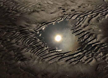 High angle view of sea shore against sky