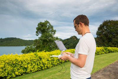 View of man using remote control