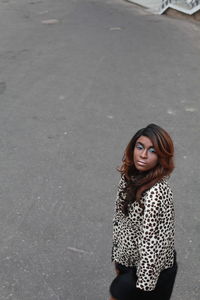 Young woman standing on street