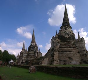 Old temple building against sky