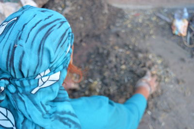 High angle view of man against blue sea