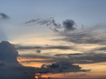 Low angle view of dramatic sky during sunset