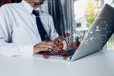 Man working on table at home