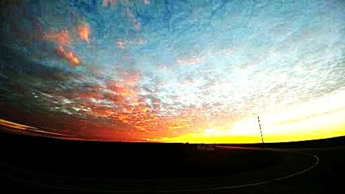 Road against sky during sunset