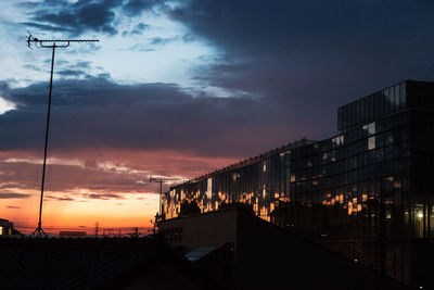 Low angle view of building at sunset