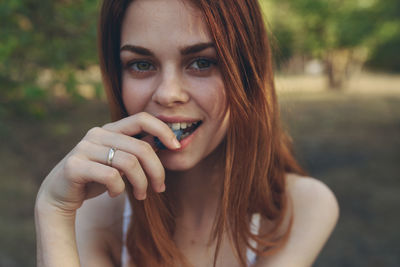 Portrait of young woman with eyes closed