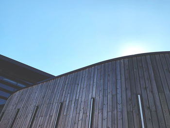 Low angle view of building against blue sky