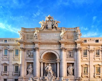 Trevi fountain against blue sky