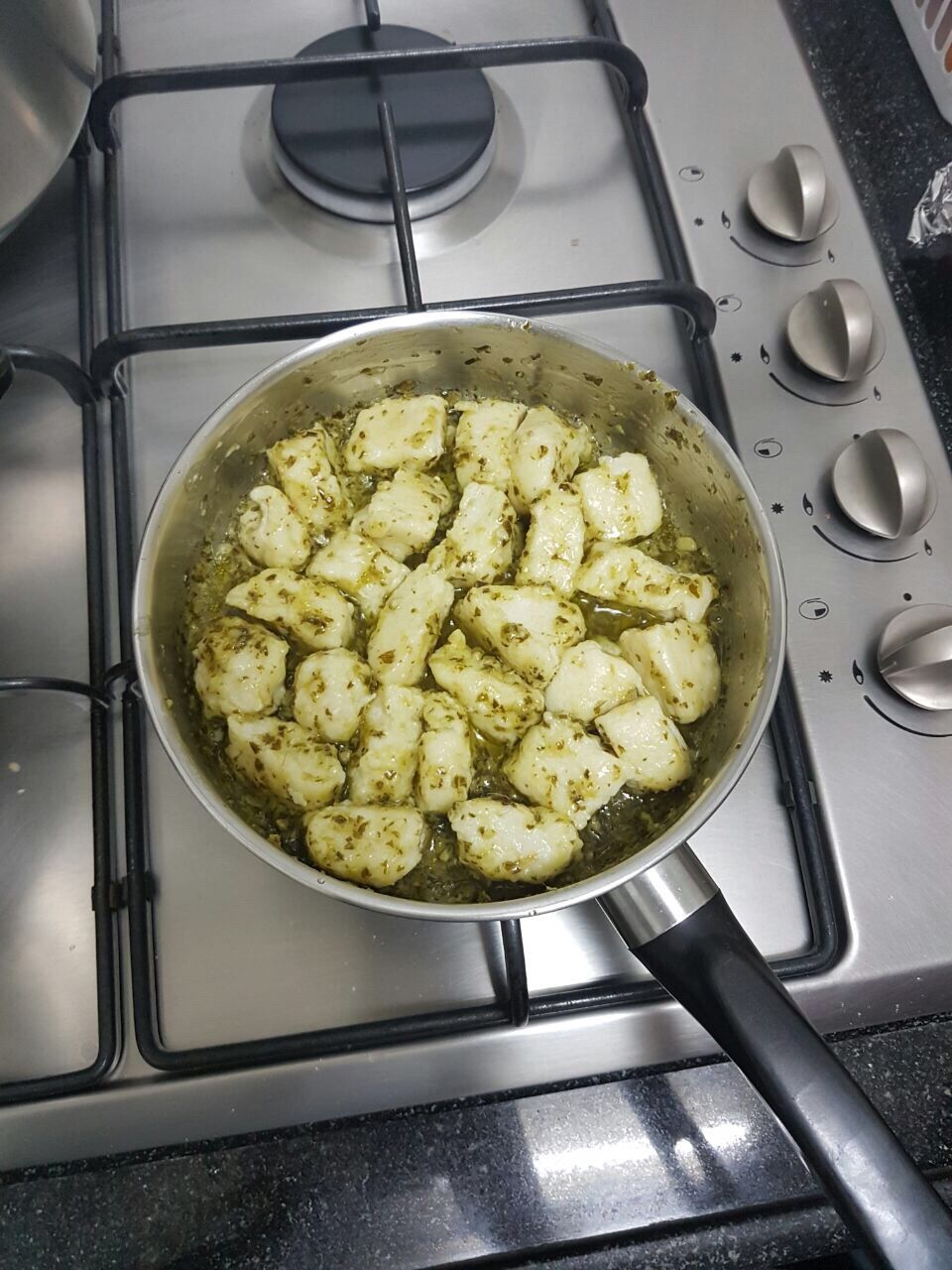 food and drink, preparation, cooking pan, stove, high angle view, food, preparing food, indoors, ingredient, freshness, no people, domestic kitchen, healthy eating, close-up, colander, gas, comfort food, day