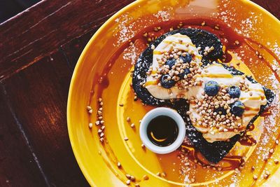 High angle view of fruits in bowl on table