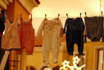 Baby clothes drying on clothesline