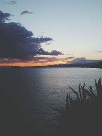 Scenic view of sea against sky at sunset