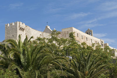 Low angle view of trees and fortress at san nicolas island