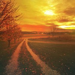 Empty road at sunset