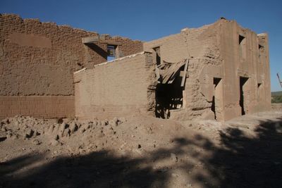 Low angle view of old building against sky