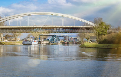 Bridge over river against sky
