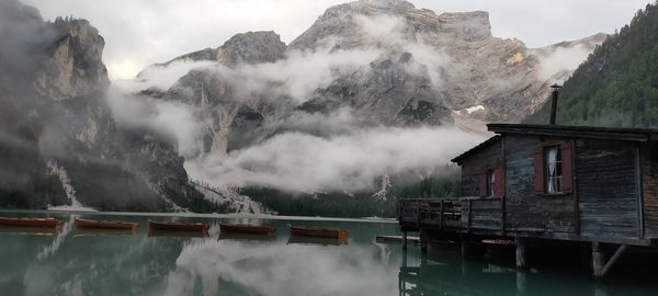 Panoramic shot of buildings and mountains against sky