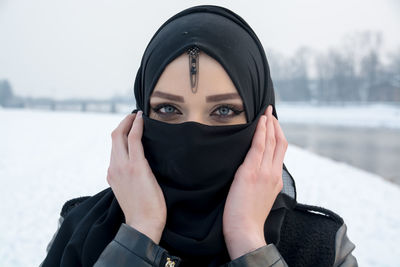 Portrait of young woman in winter