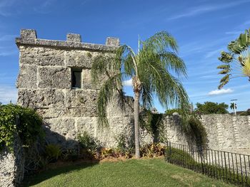 View of old building against blue sky