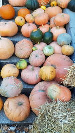 High angle view of pumpkins for sale at market stall