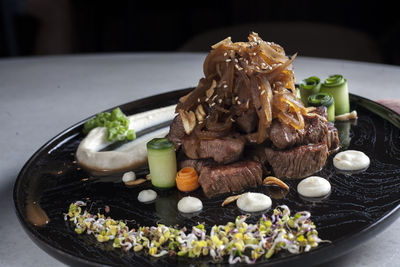 Close-up of food served on table