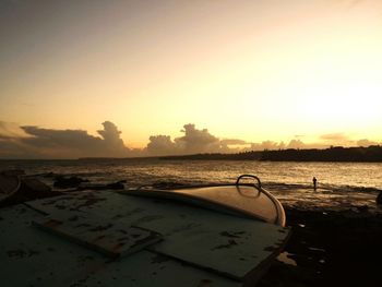 Scenic view of sea at sunset