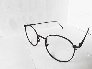 Close-up of eyeglasses on table at home