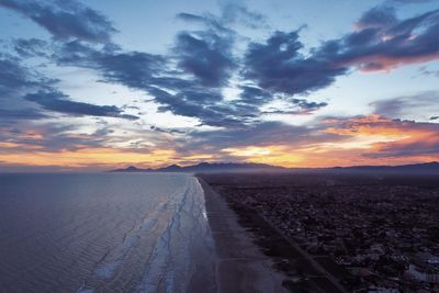 Scenic view of road against sky during sunset