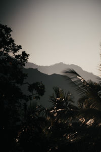 Scenic view of mountains against clear sky during sunset