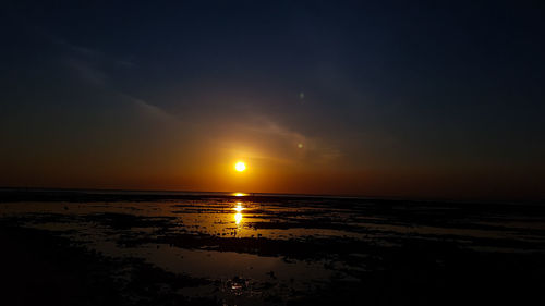 Scenic view of sea during sunset