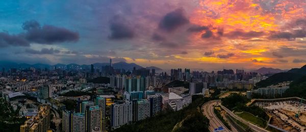 High angle view of buildings against sky during sunset