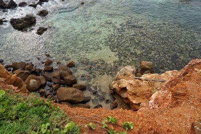 High angle view of rocks at shore