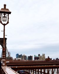 Tower in city against sky