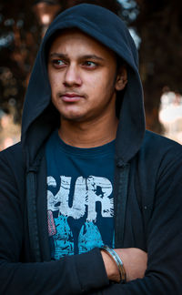 Portrait of mature man standing outdoors