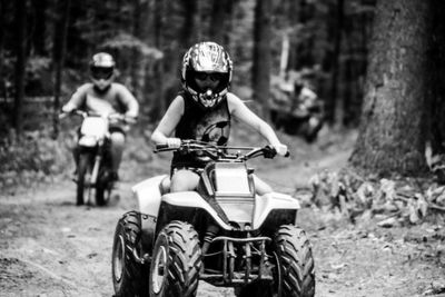 Portrait of people riding motorcycle