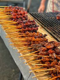 High angle view of meat on barbecue grill