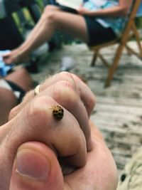 Close-up of people holding hands